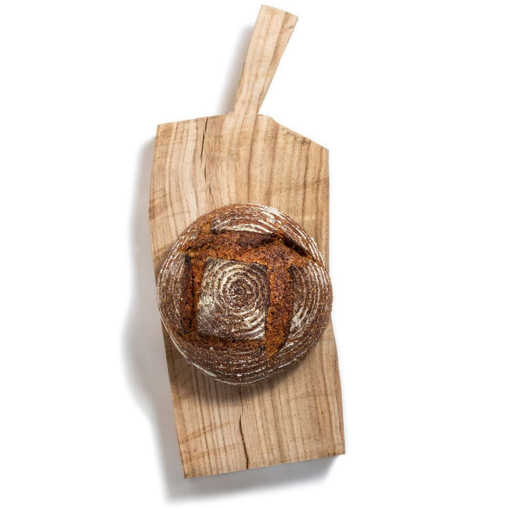 Best quality Multigrain artisan bread made by master bakers from Beyond Bread in Vancouver, BC. This delicious sourdough  round multigrain loaf is made with organic, ethically sourced flour and hand shaped. 