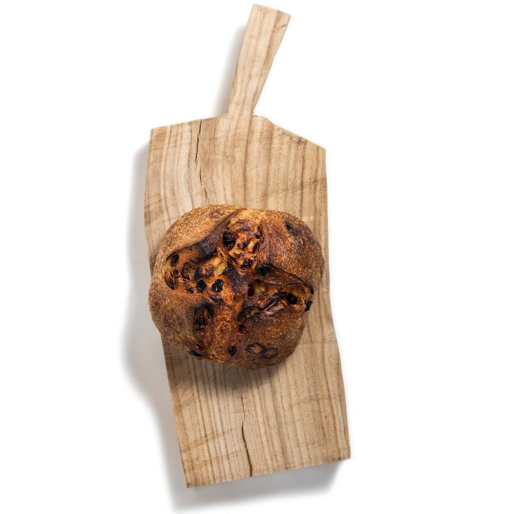 Cranberry and Walnut sourdough artisan bread made with best quality, organic, locally sourced, freshly milled flour and live yeast. Best artisan hand shaped organic breads in Vancouver.