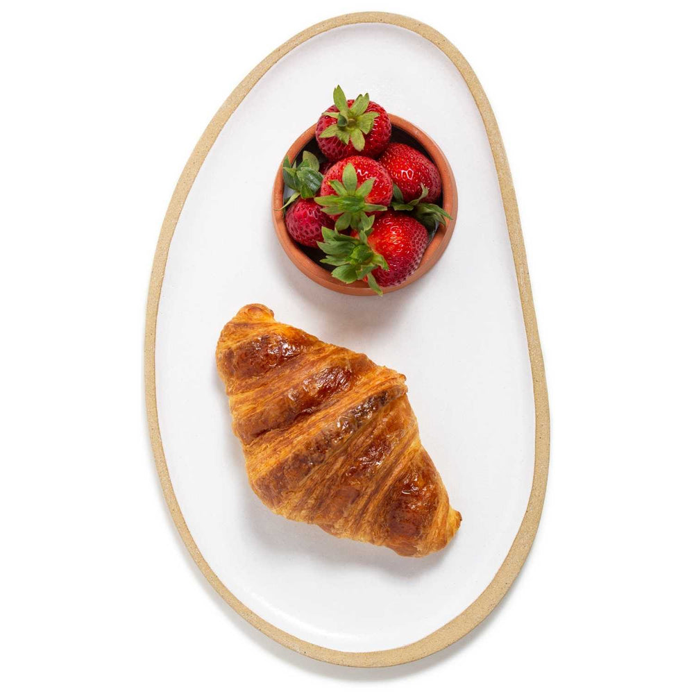The best sourdough French style croissants in Vancouver, British Columbia. Our artisan pastries are made with organic, locally sourced flour and best quality butter. Served on a ceramic plate hand made by Julie York, local artist. 