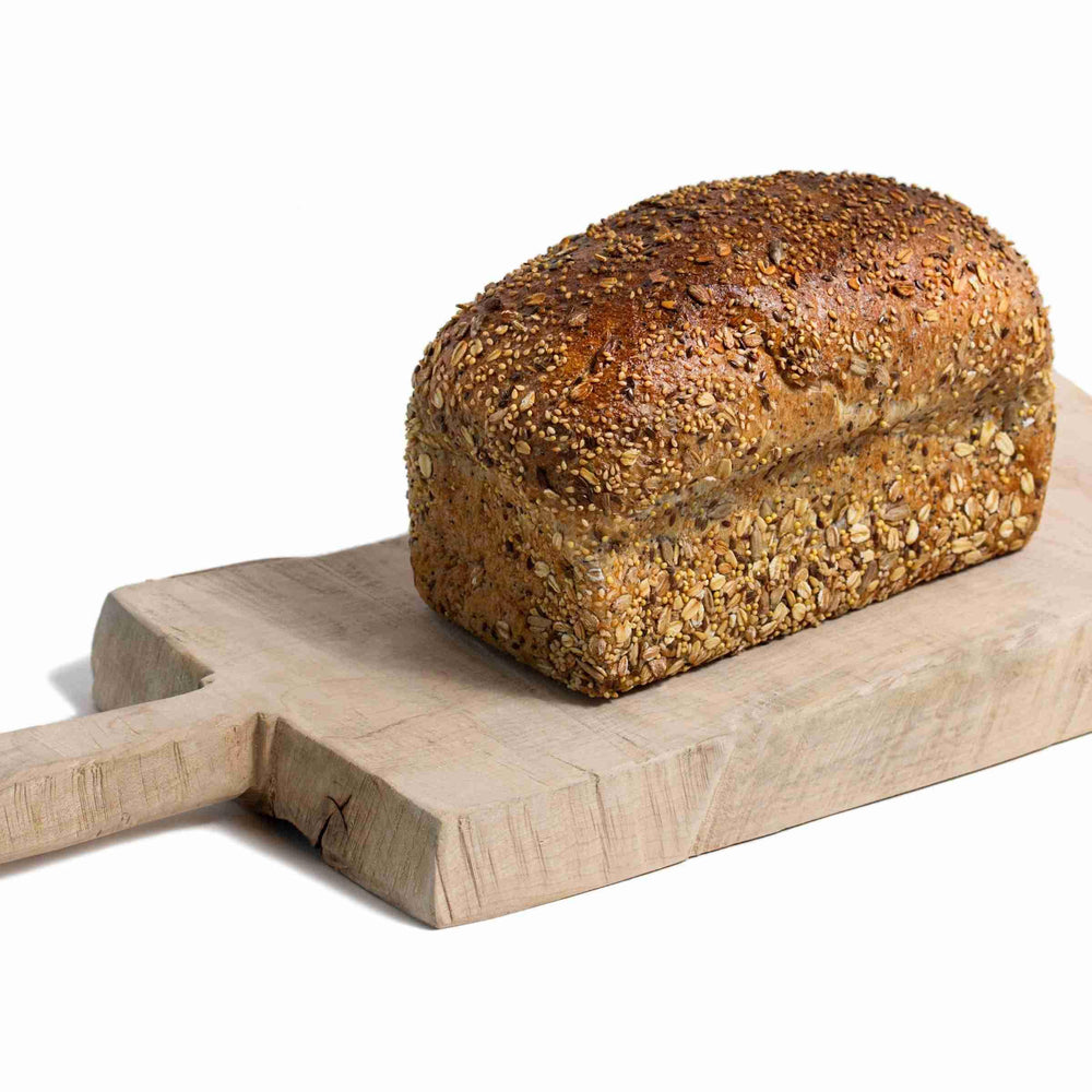 artisan classic Harvest Grain Pan loaf with seeds and packed with omega-3.  Beyond Bread Artisan Bakery Vancouver